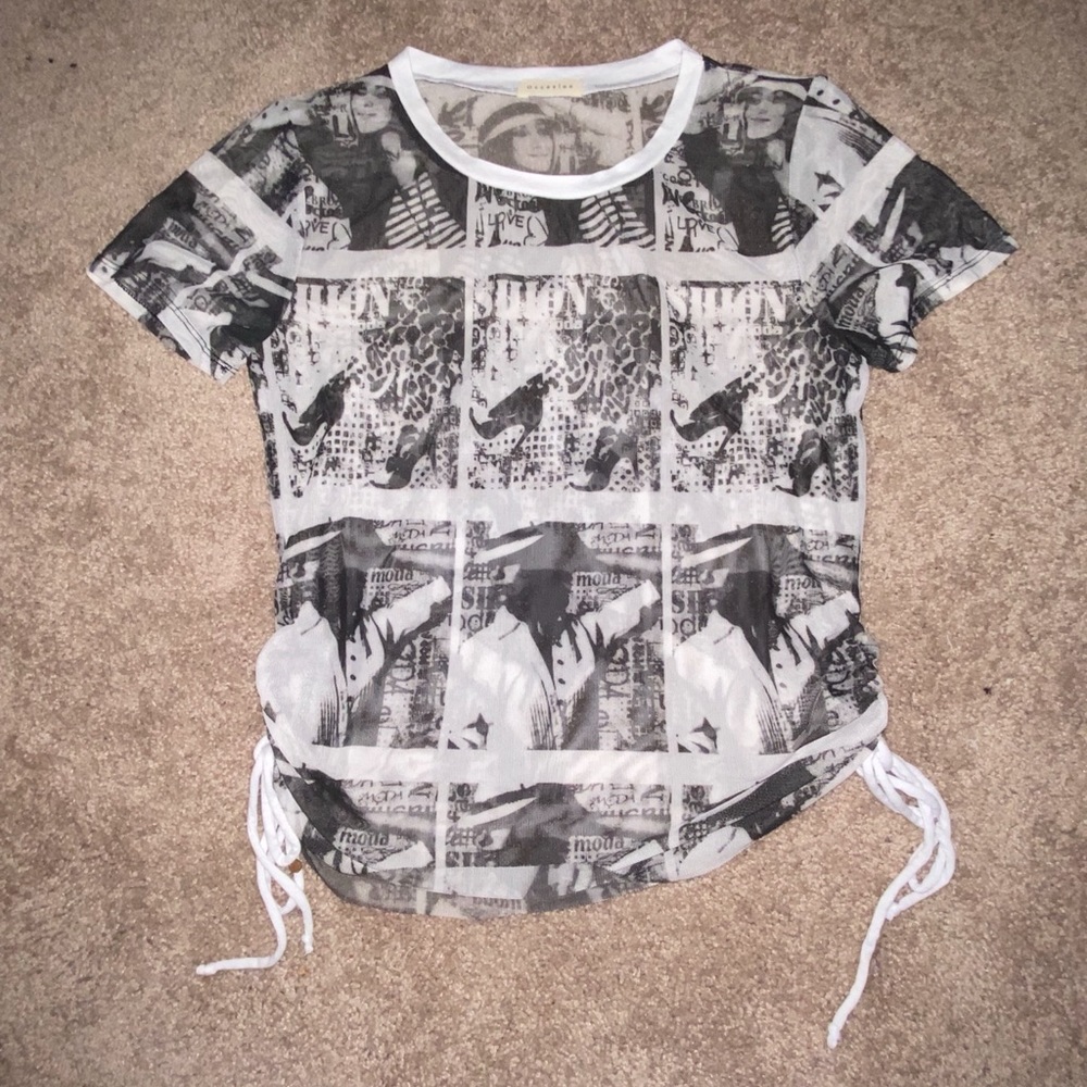 This is a black and white see through t-shirt! Fits like a size small!